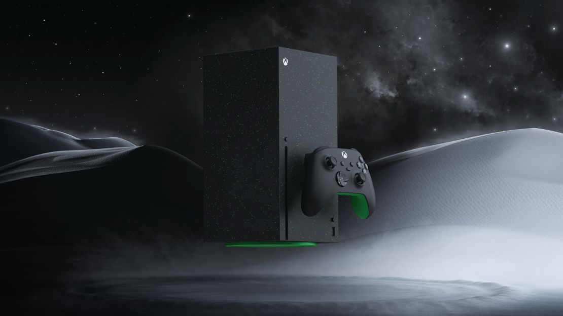 The Xbox Series X Galaxy Black with controller with a moon-like background.