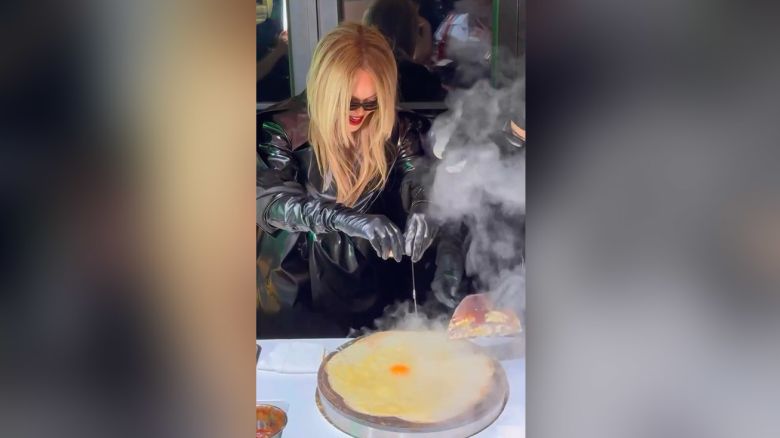 In a screengrab from Instagram, Rihanna makes pancakes in Shanghai, China, during a visit to promote her makeup line, Fenty Beauty.