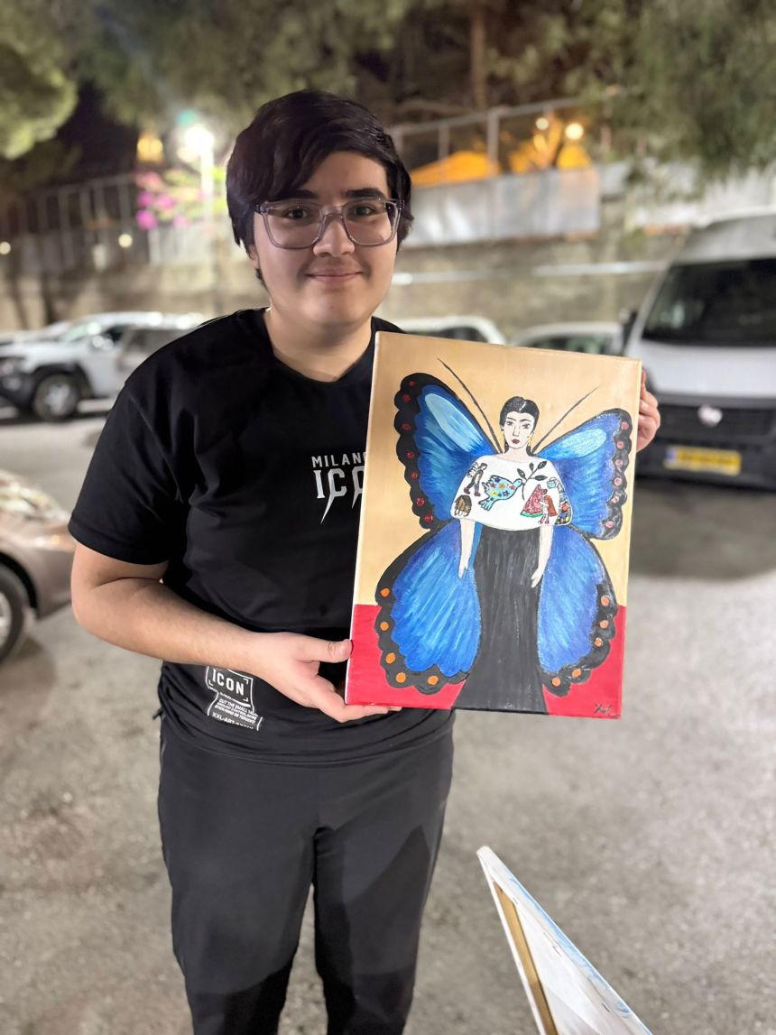 Yamen drew a picture of Rachel, a popular children's entertainer, wearing a dress embroidered with pictures of children in Gaza.