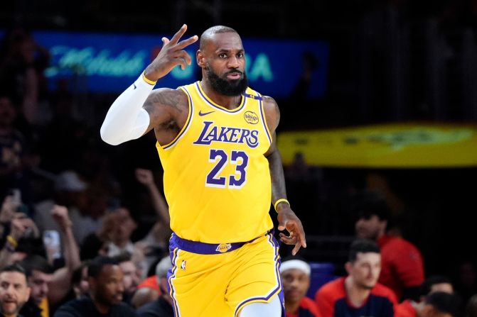 James gestures after making a 3-point basket to go over <a href="https://www.cnn.com/2025/03/04/sport/lebron-james-50k-points-nba-spt/index.html">the 50,000 career point mark</a> during a game against the New Orleans Pelicans in March 2025.