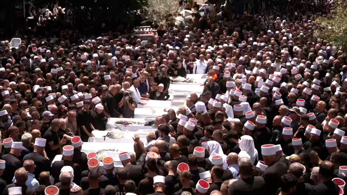 Thousands attend a funeral for the victims of Saturday’s attack on Majdal Shams.