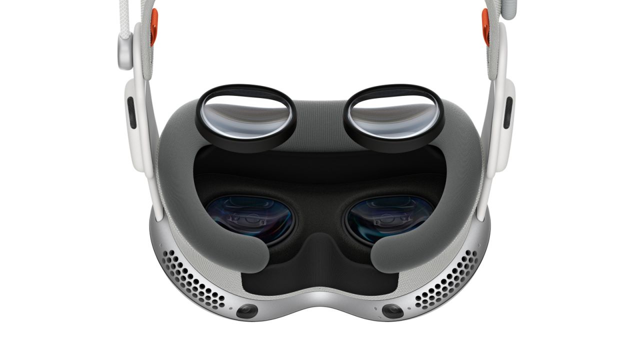 Zeiss Optical Inserts float above an Apple Vision Pro headset.