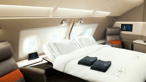The two suites on the Singapore A380 connect to form a double bed.