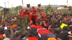 <p>Crowds gather at Nairobi airport as Kenya's PM from 2008-2013 body arrives ahead of funeral. </p>