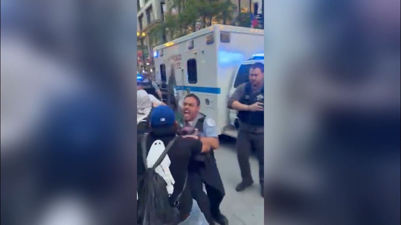 <p>Video obtained by CNN shows tense scenes as anti-ICE protesters and police clash in Chicago on Tuesday. </p>