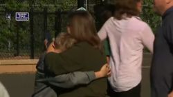 <p>Parents and families waited to pick children up from the reunification area following the shooting at Annunciation Catholic School in Minneapolis. Footage from CNN affiliate WCCO shows distraught people hugging one another, crying, and gripping hands as they wait to reunite with their children.</p>