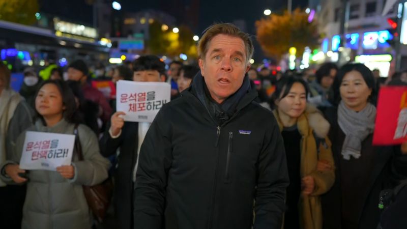 CNN reporter walks through protest in South Korea