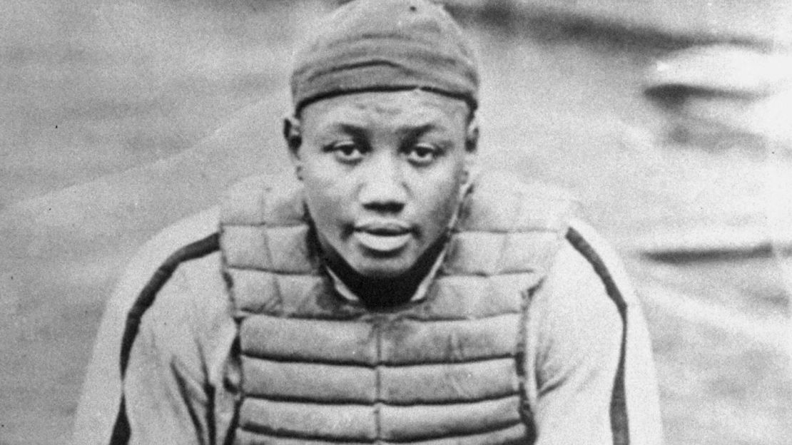 Josh Gibson, a catcher in the Negro Leagues, now holds the record for single season batting average.