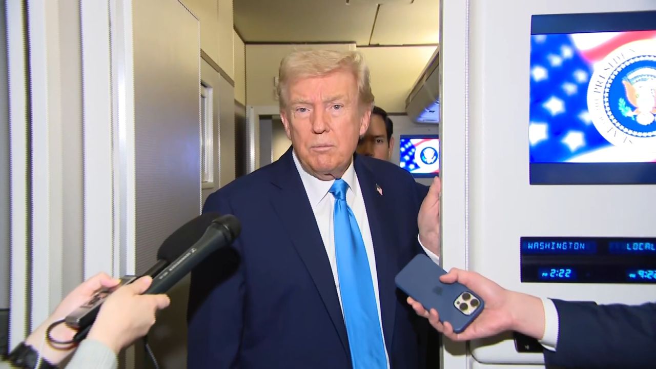 <p>President Donald Trump speaks to members of the aboard Air Force One during a refueling stop at Al-Udeid Air Base in Abu Nakhlah, Qatar, on Sunday.</p>