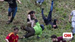 <p>One of the most unique traditions in sport, the annual Cooper's Hill Cheese Rolling competition in western England will be held this Monday. Thousands of spectators and brave competitors from all over the world will head to the iconic 200 yard hill so steep that very few participants manage to stay on their feet. World Sport's Don Riddell recently caught up with 23-time winner Chris Anderson who shared some insight on not only how to win, but also how to just make it down in one piece!</p>