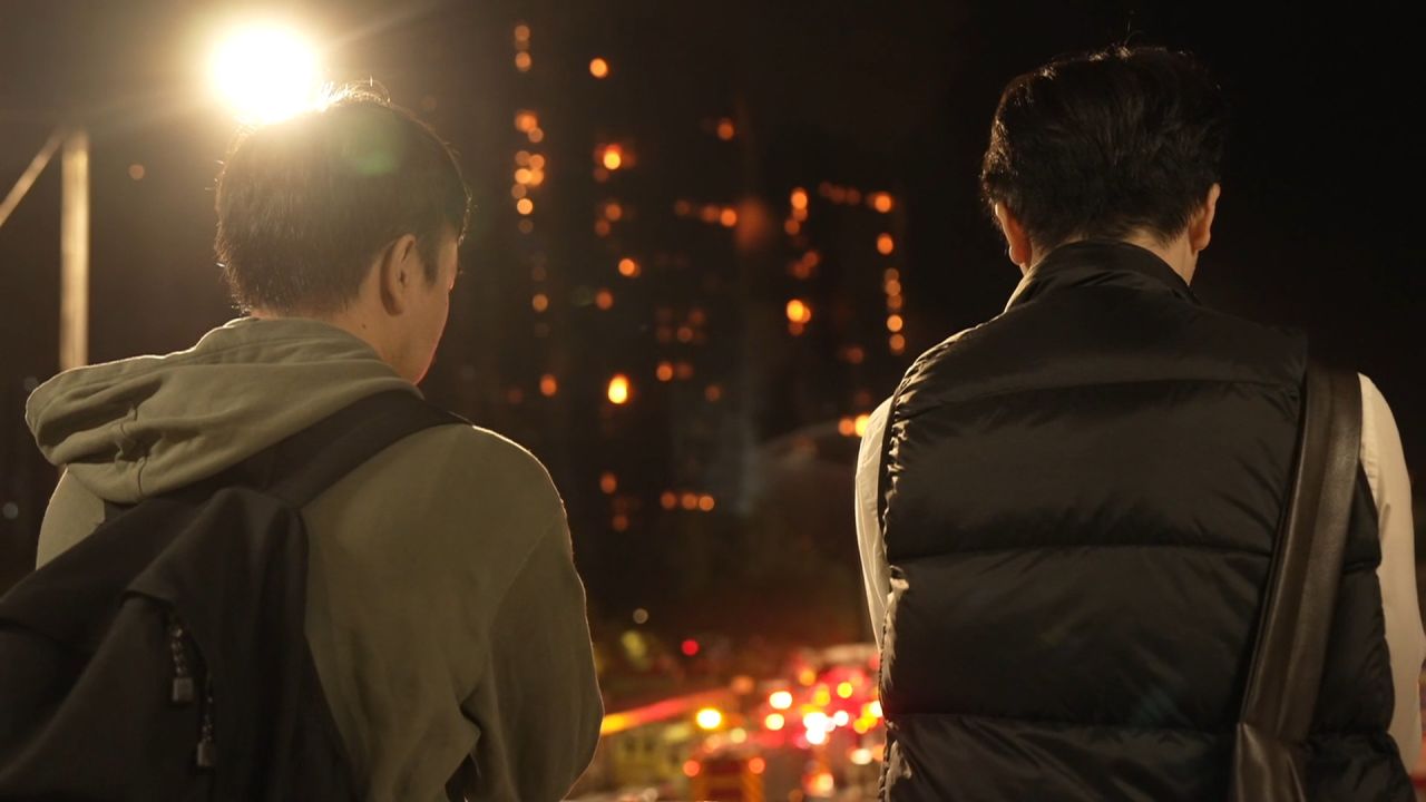<p>Residents of Hong Kong’s Tai Po district are still gathered on the streets to watch firefighters battle a blaze at an apartment complex.</p>