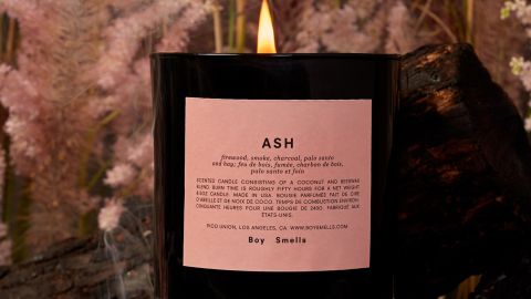 Boy Smells Ash Candle